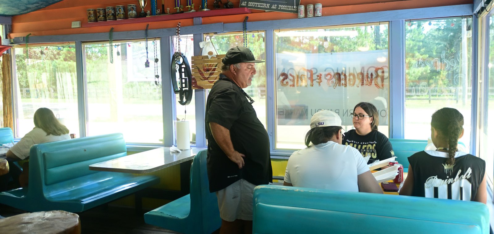 Owner Perry Boyd visits with customers