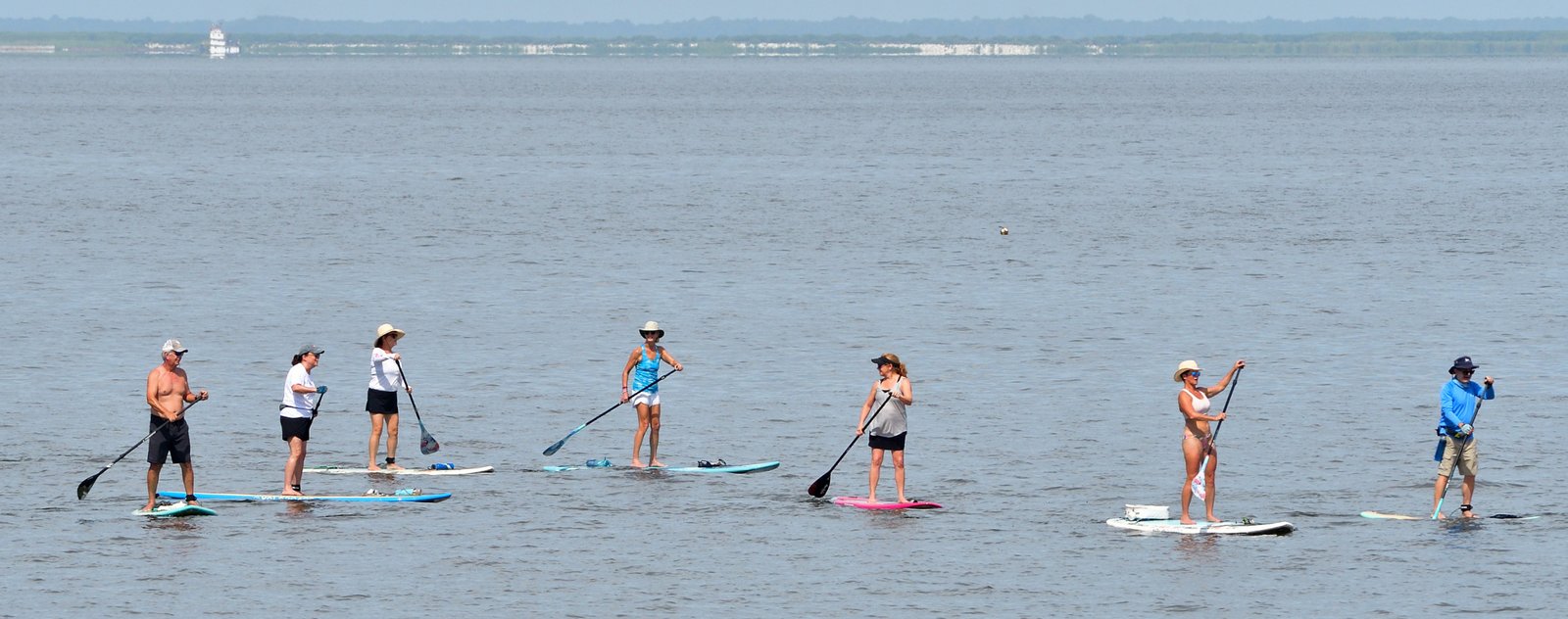 Paddle boarders in Mobile Bay