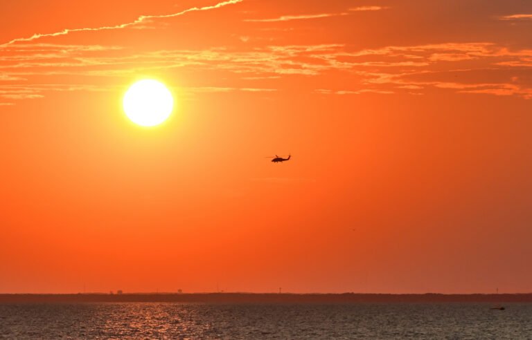 US Coast Guard sunset flight over Mobile Bay AUG 26 2025